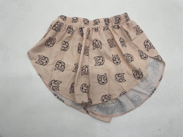 Women's beige shorts with cat print Women's beige shorts with cat print