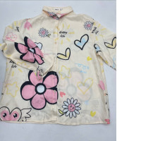 Ligh beige girl's shirt with flower print Ligh beige girl's shirt with flower print
