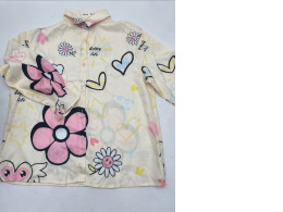 Ligh beige girl's  shirt with flower print