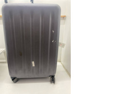 Gray rolling suitcase Gray rolling suitcase