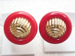 Red souvenir  earrings with a pattern