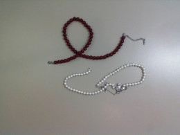 Set of 2 obese necklaces