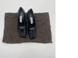 Black women's hilled shoes