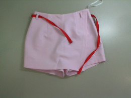 Skirt shorts with red belt Skirt shorts with red belt