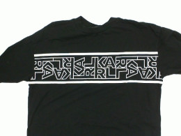 Women's short-sleeved round neck T-shirt in black with white pattern Women's short-sleeved round neck T-shirt in black with white pattern