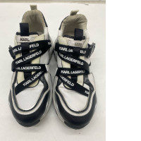 Women's white sneakers with black pattern 