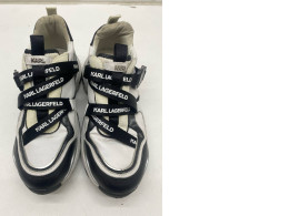 Women's white sneakers with black pattern 