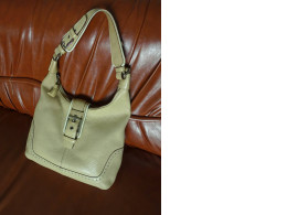 Beige women's handbag 
