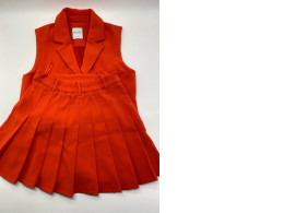 Set of 2 Women's orange sleeveless collared top and women's orange short skirt Set of 2 Women's orange sleeveless collared top and women's orange short skirt