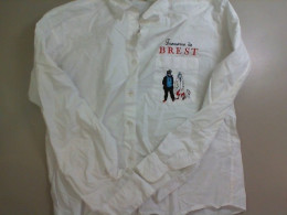 White shirt with embroidery on the pocket