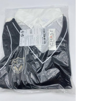 White long-sleeved shirt with black pattern 