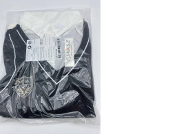 White long-sleeved shirt with black pattern 