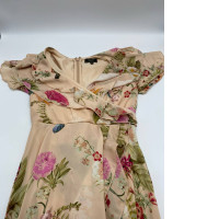 Women's cream colored short sleeve V-neck long dress with leaf pattern Women's cream colored short sleeve V-neck long dress with leaf pattern