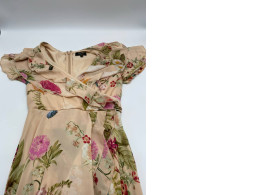 Women's cream colored short sleeve V-neck long dress with leaf pattern 