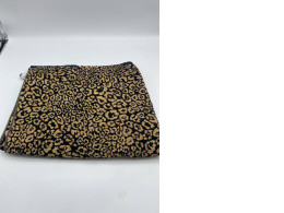 Black towel with brown pattern 