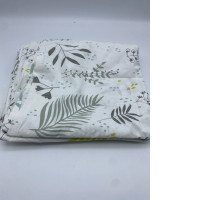White 6-foot bed sheet with leaf pattern 