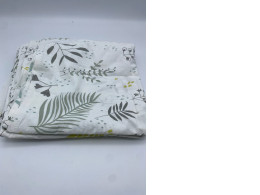 White 6-foot bed sheet with leaf pattern 