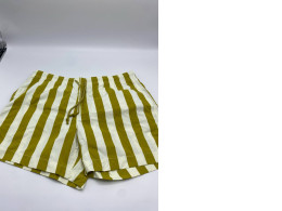 Women's green shorts with white stripes