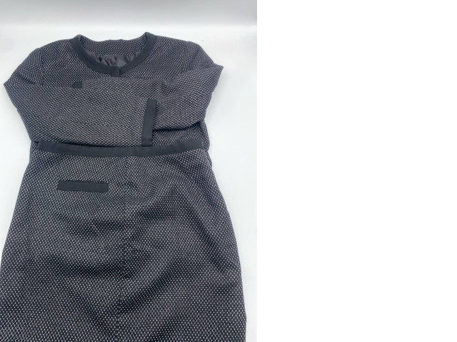 Women's long-sleeved round-neck shirt with buttons and a black short skirt with white polka dots Women's long-sleeved round-neck shirt with buttons and a black short skirt with white polka dots