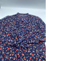 Women's blue long-sleeved shirt with floral pattern 