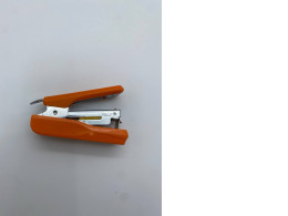 Small orange paper stapler 