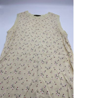 Women's cream-colored round-neck sleeveless shirt with floral pattern Women's cream-colored round-neck sleeveless shirt with floral pattern