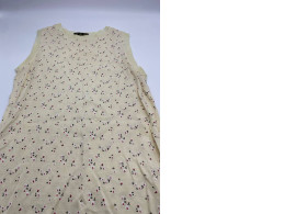 Women's cream-colored round-neck sleeveless shirt with floral pattern 
