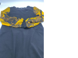 Black short dress with yellow long sleeves 