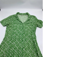 Green short dress with white floral print and collar 