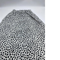 Long white skirt with black pattern 