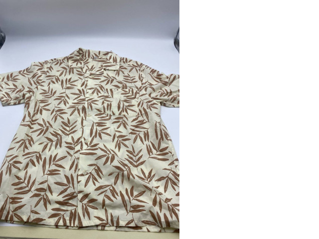 Cream colored Hawaiian shirt for kids with brown leaf pattern Cream colored Hawaiian shirt for kids with brown leaf pattern