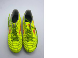 Yellow kid's football shoes