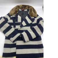 Blue button-down sweater with cream stripes Blue button-down sweater with cream stripes
