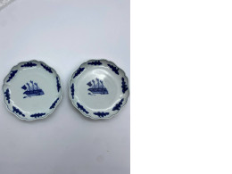 Set of 2 The white saucer has a blue sailboat pattern. Set of 2 The white saucer has a blue sailboat pattern.