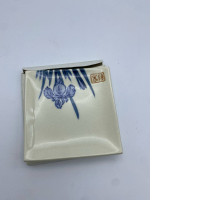 White square saucer with blue floral pattern 