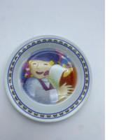 White plate with a pattern of children and dogs 