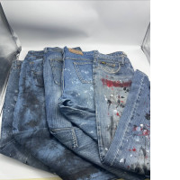 Set of secondhand painted jeans