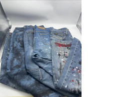 Set of secondhand painted jeans