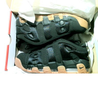 nike oranage and black shoe