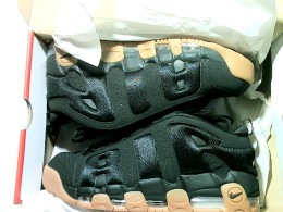 nike oranage and black shoe