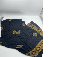 Black blanket with gold pattern