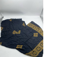 Black blanket with gold pattern