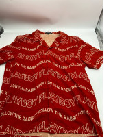 Red short-sleeved shirt with white pattern