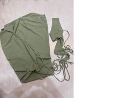 Green women's beach suit