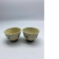 Set of 2 Cream colored Japanese ceramic sake cup with leaf pattern Set of 2 Cream colored Japanese ceramic sake cup with leaf pattern