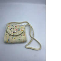 Women's cream colored shoulder bag with floral pattern 