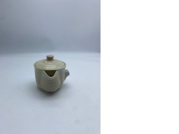 Cream colored Japanese teapot 