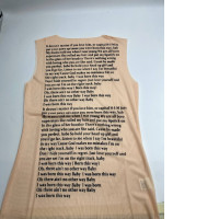 Women's cream-colored round-neck sleeveless shirt