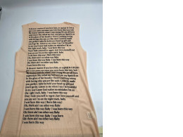 Women's cream-colored round-neck sleeveless shirt