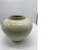 Beige vase for flowers